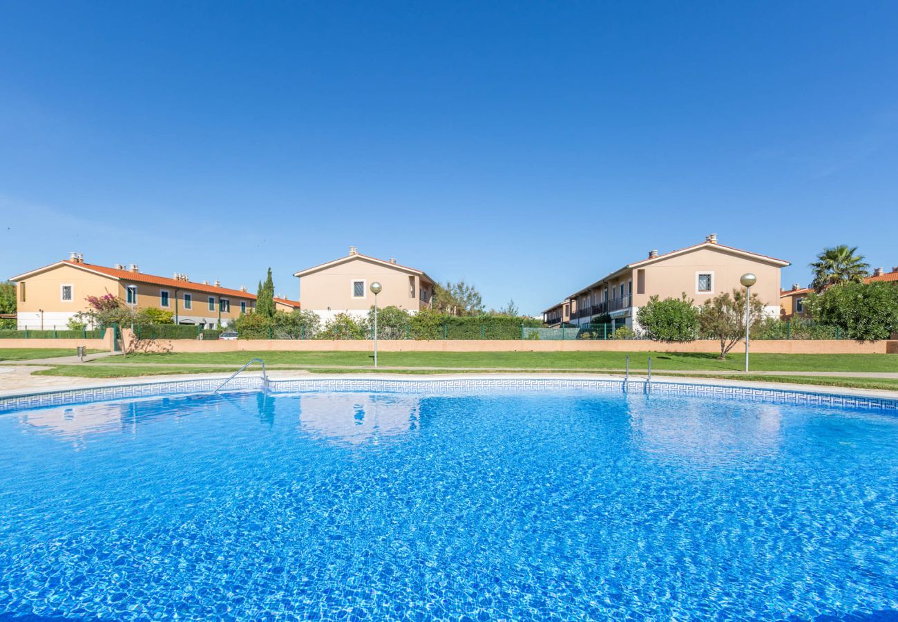 Vil.la en Torroella de Montgri - 1MP 44 - Casa adossada ubicada en un complex residencial tranquil amb piscina i jardins comunitaris a 100m de la platja de Pals